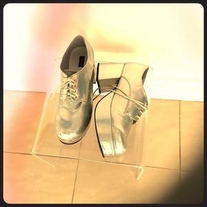 Silver Platform shoes from the 70’s